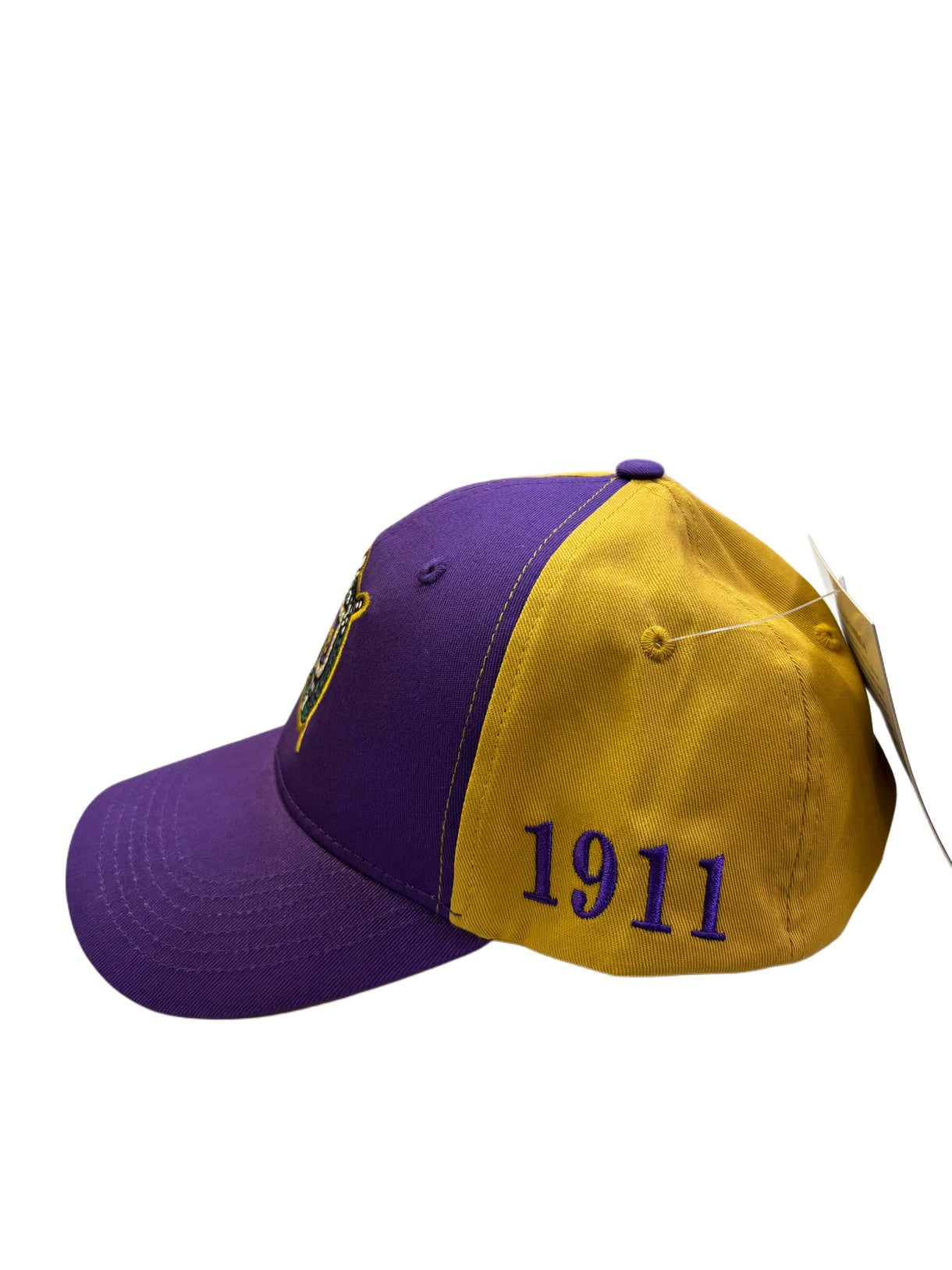 Side view of omega psi phi color block hat 1911 founding year.