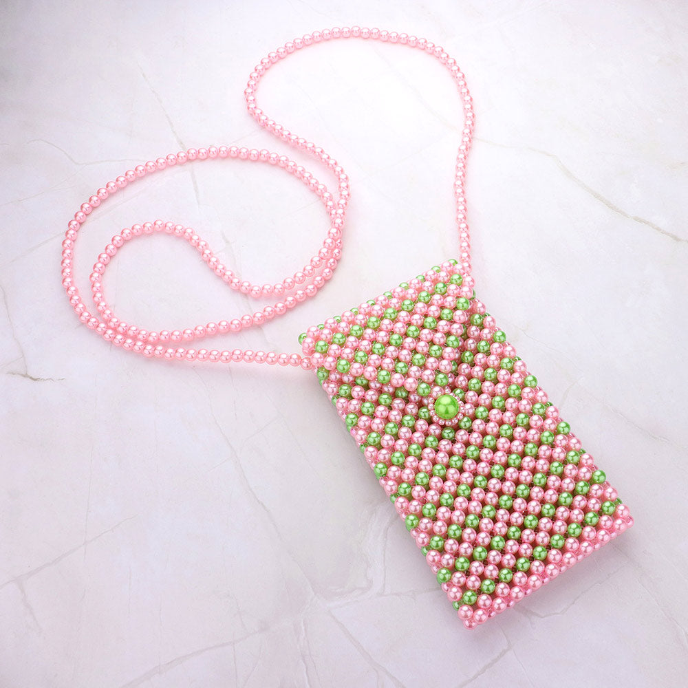 Close-up of the pink and green beads on the phone holder crossbody bag.