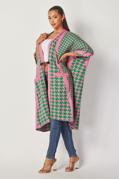 Fashionable houndstooth poncho, a must-have for your wardrobe.